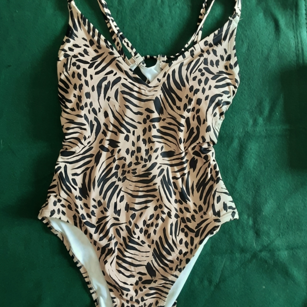 Swimsuit with cross back drawstring tie.